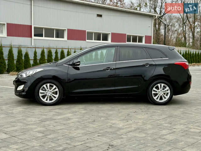 Чорний Хендай i30, об'ємом двигуна 1.6 л та пробігом 202 тис. км за 12500 $, фото 5 на Automoto.ua