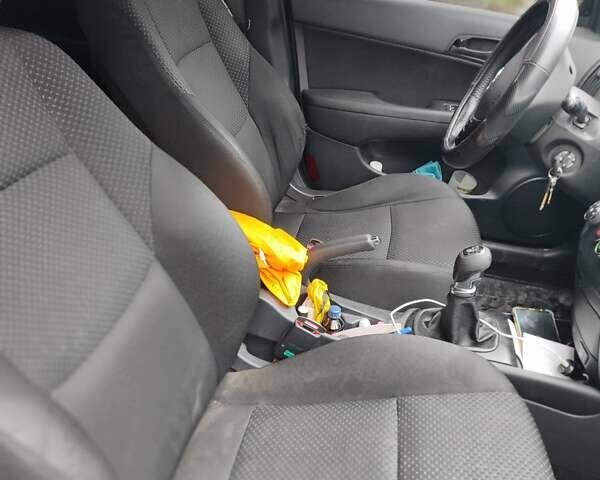 Черный Хендай i30, объемом двигателя 1.58 л и пробегом 210 тыс. км за 7500 $, фото 1 на Automoto.ua