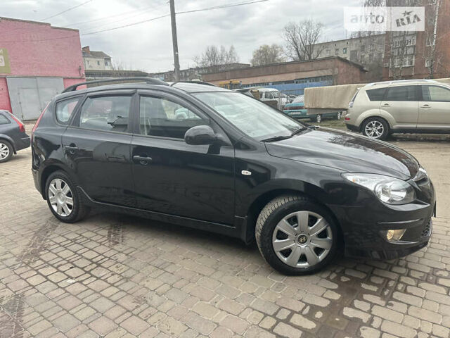 Чорний Хендай i30, об'ємом двигуна 1.58 л та пробігом 175 тис. км за 7500 $, фото 5 на Automoto.ua