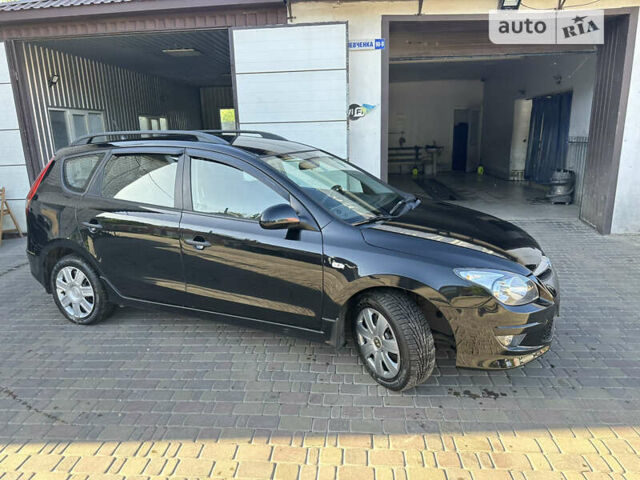 Чорний Хендай i30, об'ємом двигуна 1.58 л та пробігом 175 тис. км за 7500 $, фото 17 на Automoto.ua