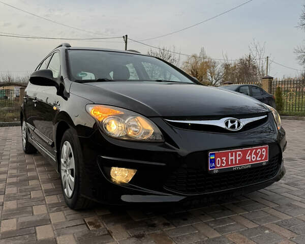 Черный Хендай i30, объемом двигателя 1.4 л и пробегом 210 тыс. км за 6750 $, фото 12 на Automoto.ua