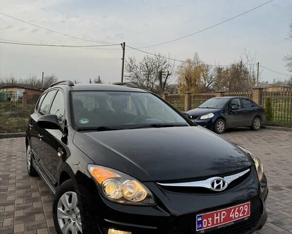 Черный Хендай i30, объемом двигателя 1.4 л и пробегом 210 тыс. км за 6750 $, фото 15 на Automoto.ua