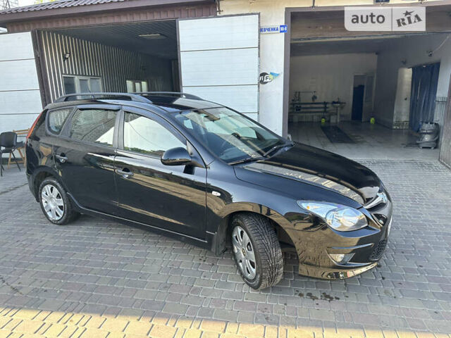 Чорний Хендай i30, об'ємом двигуна 1.58 л та пробігом 175 тис. км за 7500 $, фото 18 на Automoto.ua