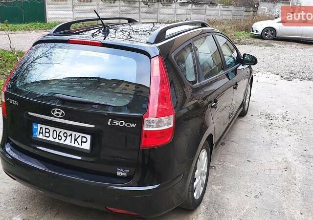 Черный Хендай i30, объемом двигателя 1.4 л и пробегом 275 тыс. км за 6000 $, фото 8 на Automoto.ua