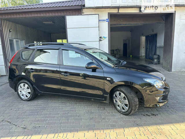 Чорний Хендай i30, об'ємом двигуна 1.58 л та пробігом 175 тис. км за 7500 $, фото 16 на Automoto.ua