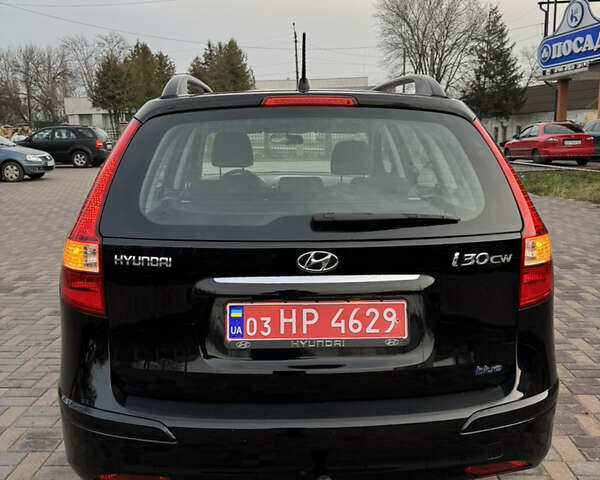 Черный Хендай i30, объемом двигателя 1.4 л и пробегом 210 тыс. км за 6750 $, фото 7 на Automoto.ua