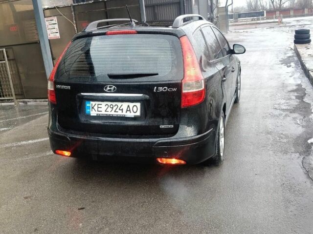Черный Хендай i30, объемом двигателя 1.58 л и пробегом 213 тыс. км за 6899 $, фото 2 на Automoto.ua