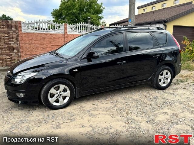 Черный Хендай i30, объемом двигателя 1.6 л и пробегом 209 тыс. км за 7300 $, фото 1 на Automoto.ua