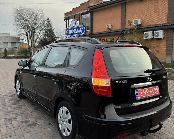 Черный Хендай i30, объемом двигателя 1.4 л и пробегом 210 тыс. км за 6750 $, фото 6 на Automoto.ua