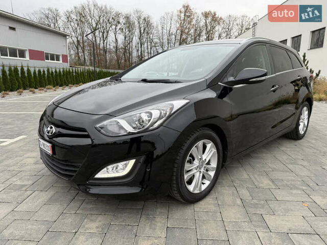 Чорний Хендай i30, об'ємом двигуна 1.6 л та пробігом 202 тис. км за 12500 $, фото 10 на Automoto.ua