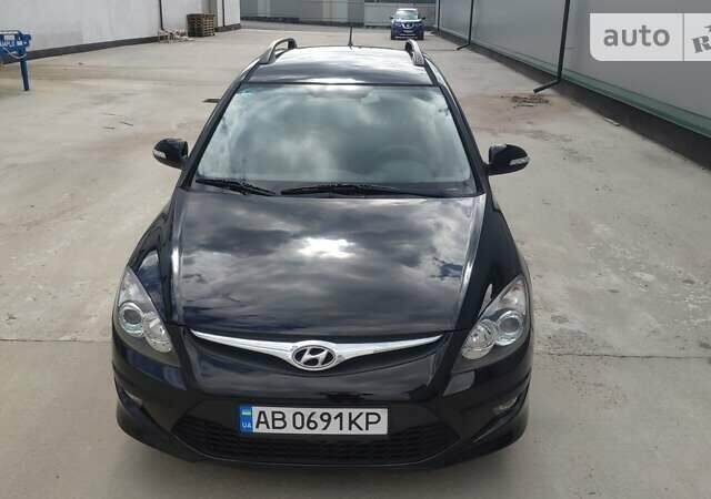 Черный Хендай i30, объемом двигателя 1.4 л и пробегом 275 тыс. км за 7100 $, фото 3 на Automoto.ua