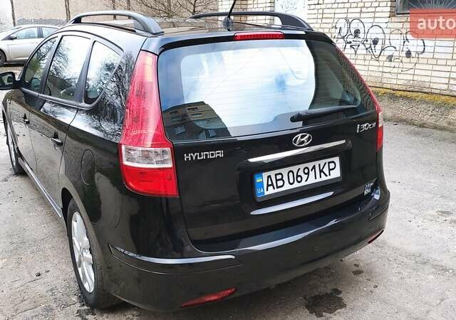 Черный Хендай i30, объемом двигателя 1.4 л и пробегом 275 тыс. км за 6000 $, фото 11 на Automoto.ua