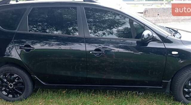 Чорний Хендай i30, об'ємом двигуна 1.59 л та пробігом 145 тис. км за 6499 $, фото 5 на Automoto.ua