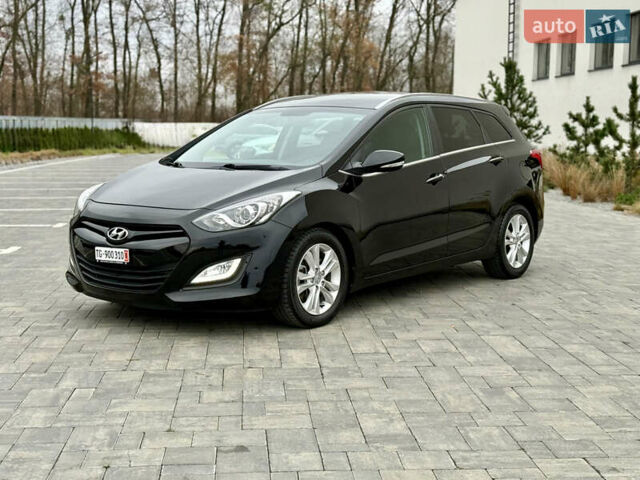 Чорний Хендай i30, об'ємом двигуна 1.6 л та пробігом 202 тис. км за 12500 $, фото 6 на Automoto.ua