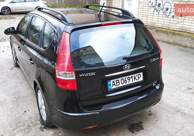Черный Хендай i30, объемом двигателя 1.4 л и пробегом 275 тыс. км за 6000 $, фото 12 на Automoto.ua