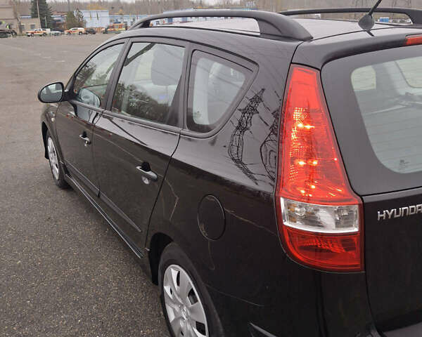 Чорний Хендай i30, об'ємом двигуна 1.4 л та пробігом 209 тис. км за 6850 $, фото 5 на Automoto.ua