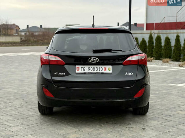 Чорний Хендай i30, об'ємом двигуна 1.6 л та пробігом 202 тис. км за 12500 $, фото 3 на Automoto.ua