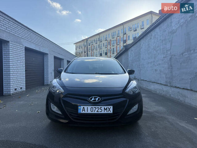 Чорний Хендай i30, об'ємом двигуна 1.59 л та пробігом 260 тис. км за 9000 $, фото 5 на Automoto.ua