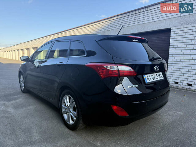 Чорний Хендай i30, об'ємом двигуна 1.59 л та пробігом 260 тис. км за 9000 $, фото 3 на Automoto.ua