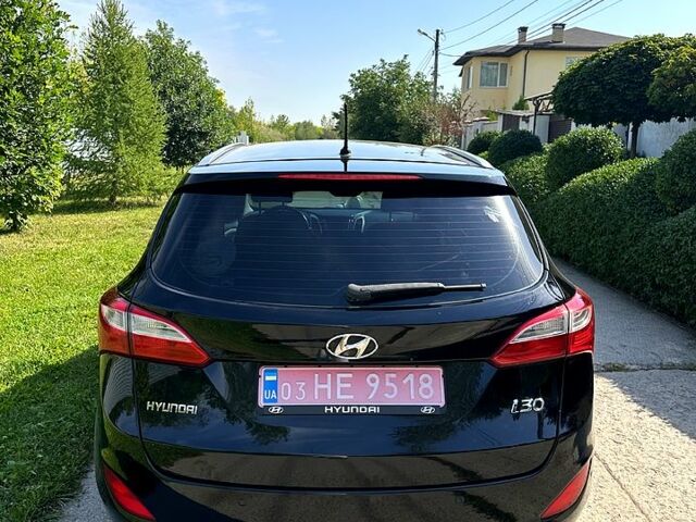 Чорний Хендай i30, об'ємом двигуна 1.6 л та пробігом 167 тис. км за 8400 $, фото 2 на Automoto.ua
