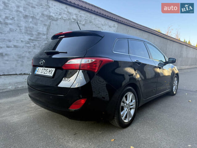 Чорний Хендай i30, об'ємом двигуна 1.59 л та пробігом 260 тис. км за 9000 $, фото 1 на Automoto.ua