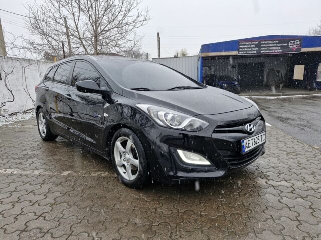 Черный Хендай i30, объемом двигателя 1.6 л и пробегом 150 тыс. км за 7700 $, фото 2 на Automoto.ua
