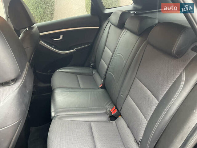 Чорний Хендай i30, об'ємом двигуна 1.6 л та пробігом 221 тис. км за 8650 $, фото 76 на Automoto.ua