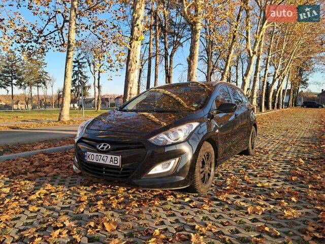 Черный Хендай i30, объемом двигателя 1.58 л и пробегом 132 тыс. км за 9500 $, фото 12 на Automoto.ua