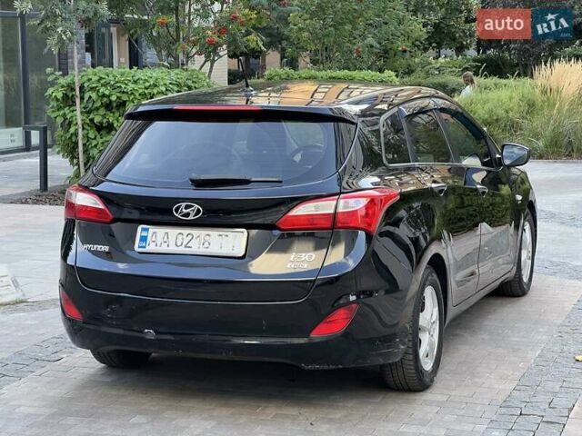 Черный Хендай i30, объемом двигателя 1.58 л и пробегом 153 тыс. км за 9500 $, фото 20 на Automoto.ua