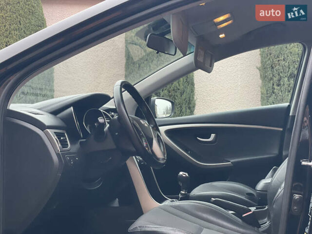 Чорний Хендай i30, об'ємом двигуна 1.6 л та пробігом 221 тис. км за 8650 $, фото 52 на Automoto.ua