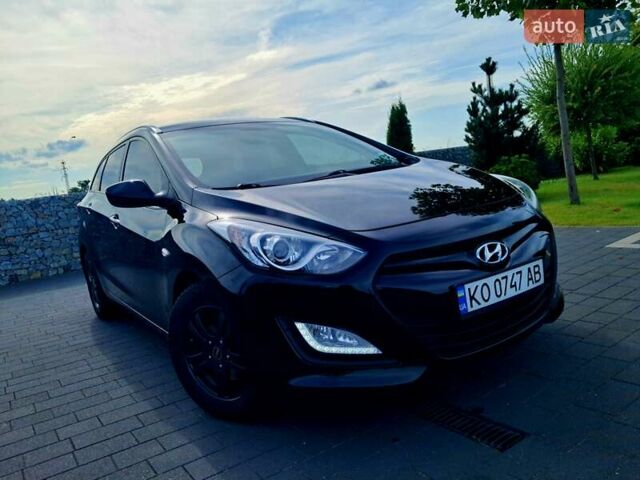 Черный Хендай i30, объемом двигателя 1.58 л и пробегом 129 тыс. км за 9900 $, фото 4 на Automoto.ua