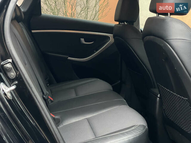 Чорний Хендай i30, об'ємом двигуна 1.6 л та пробігом 221 тис. км за 8650 $, фото 79 на Automoto.ua
