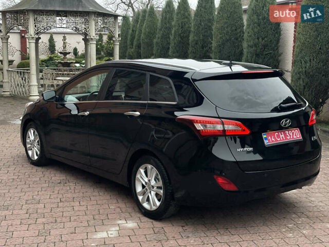 Чорний Хендай i30, об'ємом двигуна 1.6 л та пробігом 221 тис. км за 8650 $, фото 28 на Automoto.ua