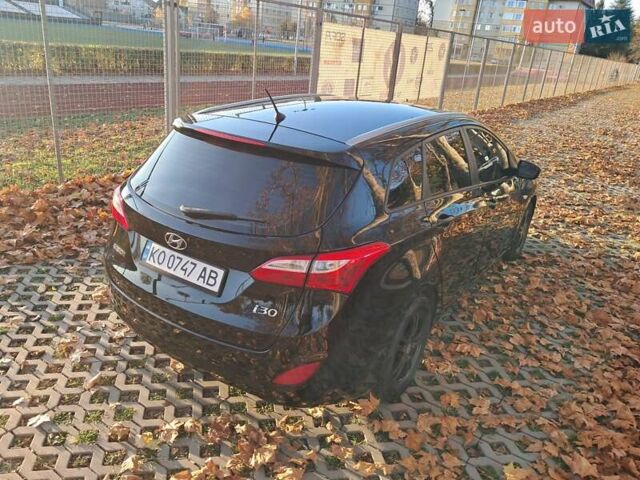 Черный Хендай i30, объемом двигателя 1.58 л и пробегом 132 тыс. км за 9500 $, фото 18 на Automoto.ua