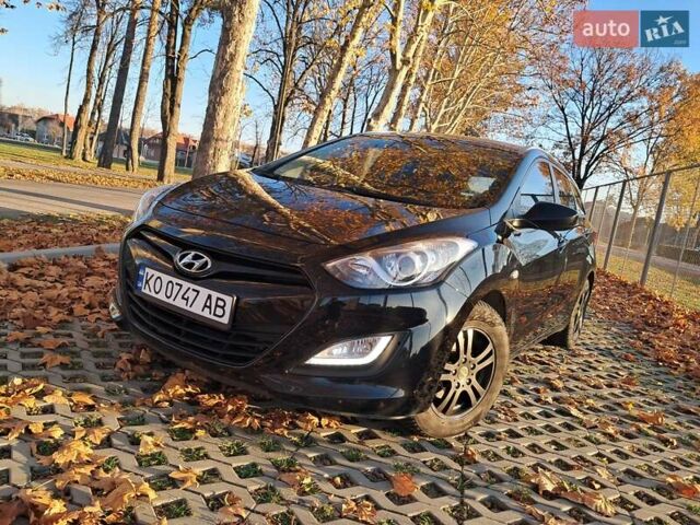 Черный Хендай i30, объемом двигателя 1.58 л и пробегом 132 тыс. км за 9500 $, фото 8 на Automoto.ua