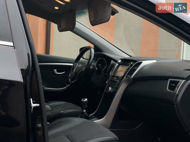 Чорний Хендай i30, об'ємом двигуна 1.6 л та пробігом 221 тис. км за 8650 $, фото 85 на Automoto.ua