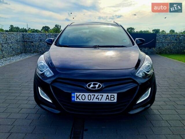 Черный Хендай i30, объемом двигателя 1.58 л и пробегом 129 тыс. км за 9900 $, фото 6 на Automoto.ua