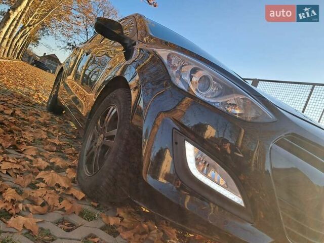 Черный Хендай i30, объемом двигателя 1.58 л и пробегом 132 тыс. км за 9500 $, фото 14 на Automoto.ua