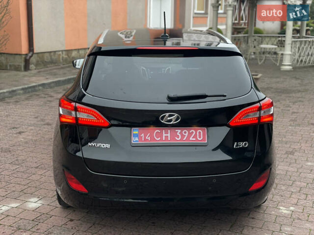 Чорний Хендай i30, об'ємом двигуна 1.6 л та пробігом 221 тис. км за 8650 $, фото 3 на Automoto.ua
