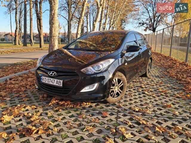 Черный Хендай i30, объемом двигателя 1.58 л и пробегом 132 тыс. км за 9500 $, фото 10 на Automoto.ua