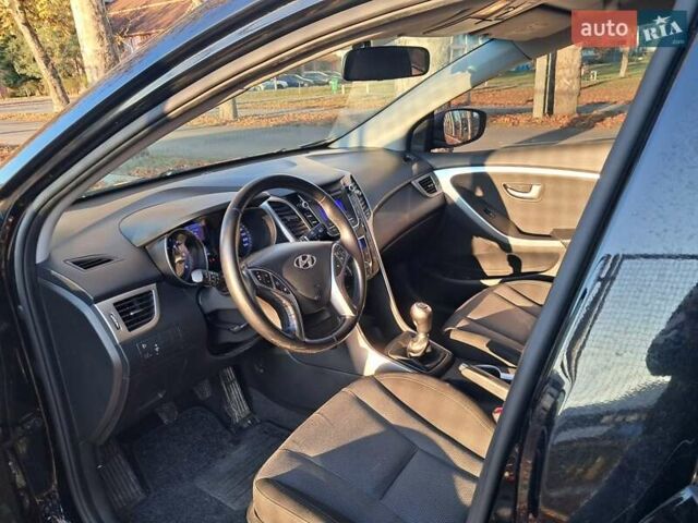 Черный Хендай i30, объемом двигателя 1.58 л и пробегом 132 тыс. км за 9500 $, фото 24 на Automoto.ua