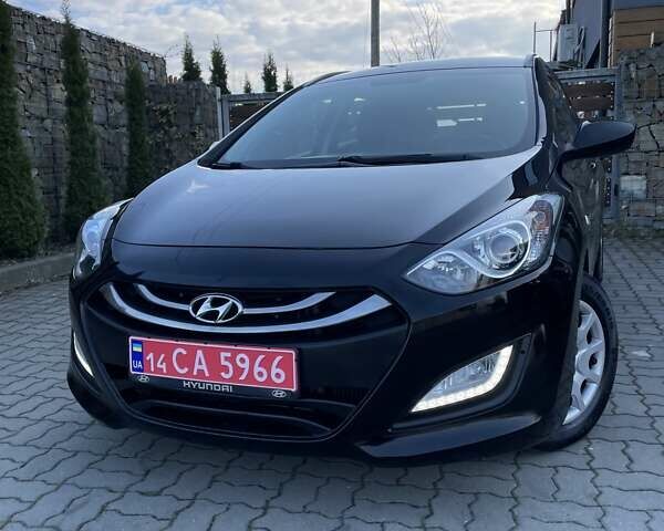 Чорний Хендай i30, об'ємом двигуна 1.58 л та пробігом 173 тис. км за 9995 $, фото 4 на Automoto.ua