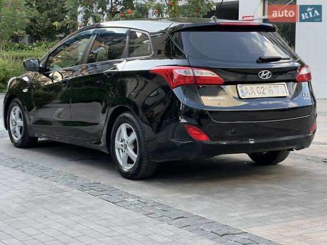 Черный Хендай i30, объемом двигателя 1.58 л и пробегом 153 тыс. км за 9500 $, фото 18 на Automoto.ua