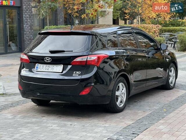 Хендай i30 2014 в Киеве на Automoto.ua Черный Хендай i30, объемом двигателя 1.58 л и пробегом 153 тыс. км за 8900 $, фото 13 на Automoto.ua