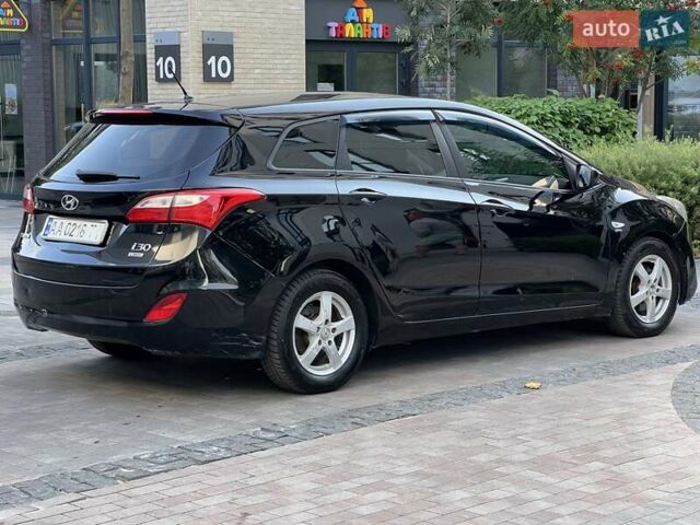 Черный Хендай i30, объемом двигателя 1.58 л и пробегом 153 тыс. км за 9500 $, фото 17 на Automoto.ua
