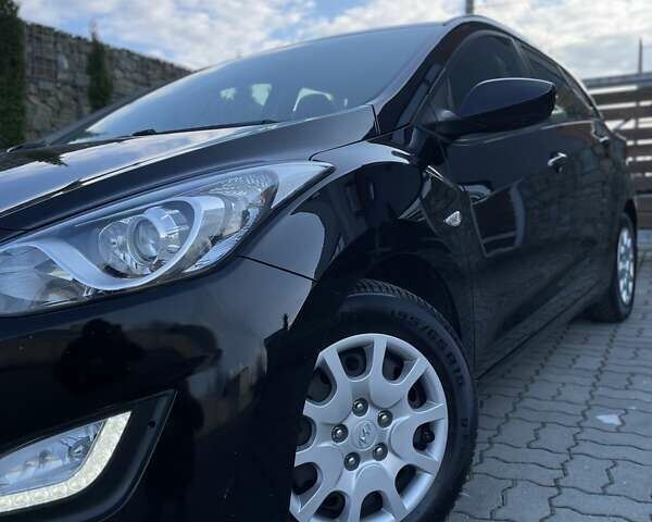 Чорний Хендай i30, об'ємом двигуна 1.58 л та пробігом 173 тис. км за 9995 $, фото 18 на Automoto.ua