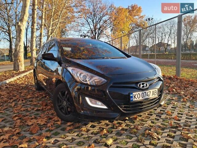 Черный Хендай i30, объемом двигателя 1.58 л и пробегом 132 тыс. км за 9500 $, фото 7 на Automoto.ua