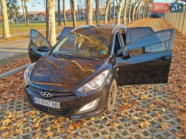 Черный Хендай i30, объемом двигателя 1.58 л и пробегом 132 тыс. км за 9500 $, фото 28 на Automoto.ua