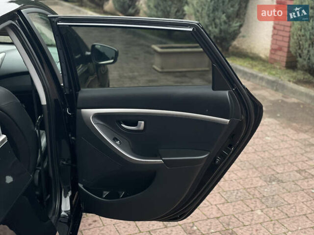 Чорний Хендай i30, об'ємом двигуна 1.6 л та пробігом 221 тис. км за 8650 $, фото 77 на Automoto.ua