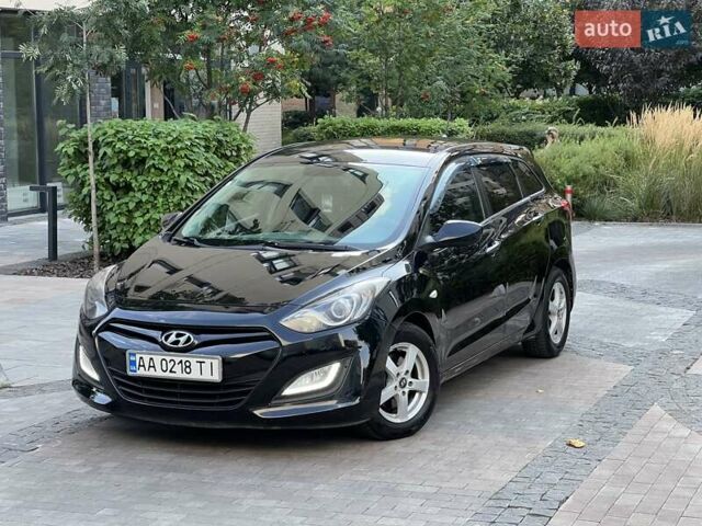 Черный Хендай i30, объемом двигателя 1.58 л и пробегом 153 тыс. км за 9500 $, фото 4 на Automoto.ua